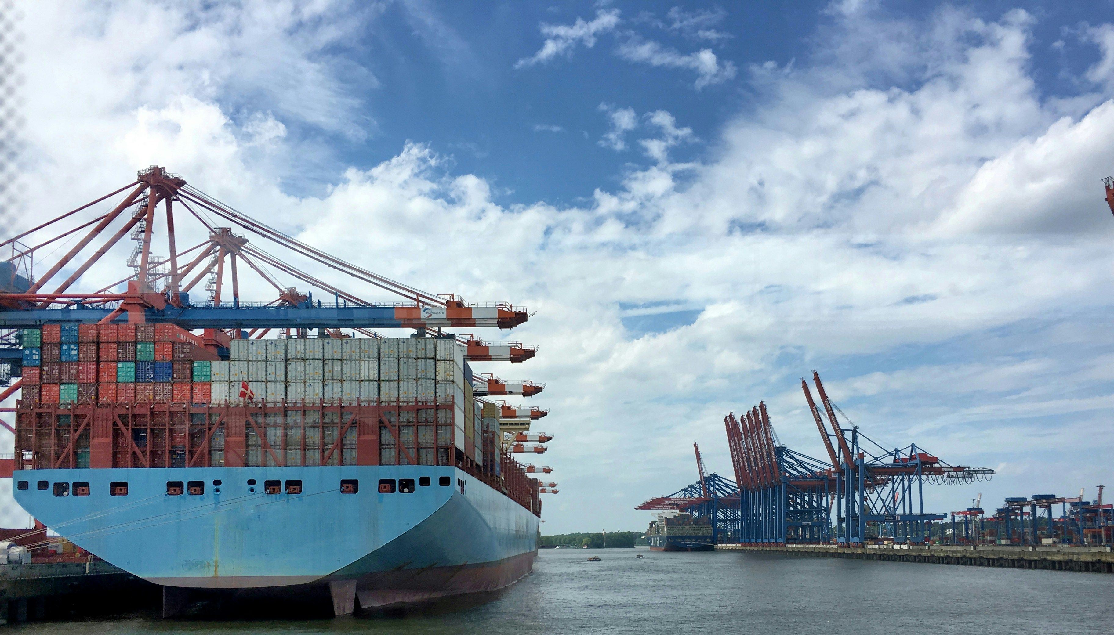 Container vessel at a terminal berth, part of the mode-mix review run for a manufacturing client